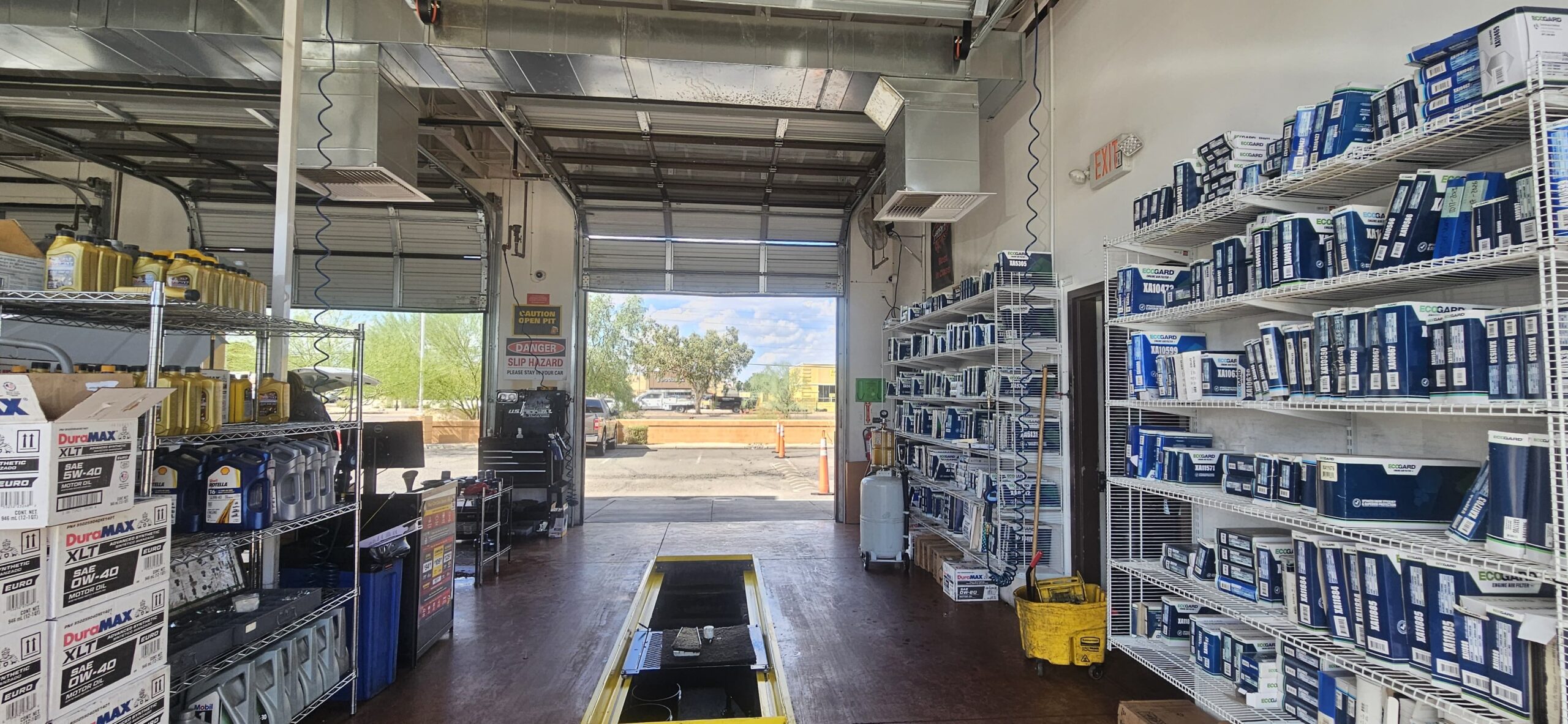 Repaired commercial garage door operating at Take 5 Oil Change on W Bell Rd