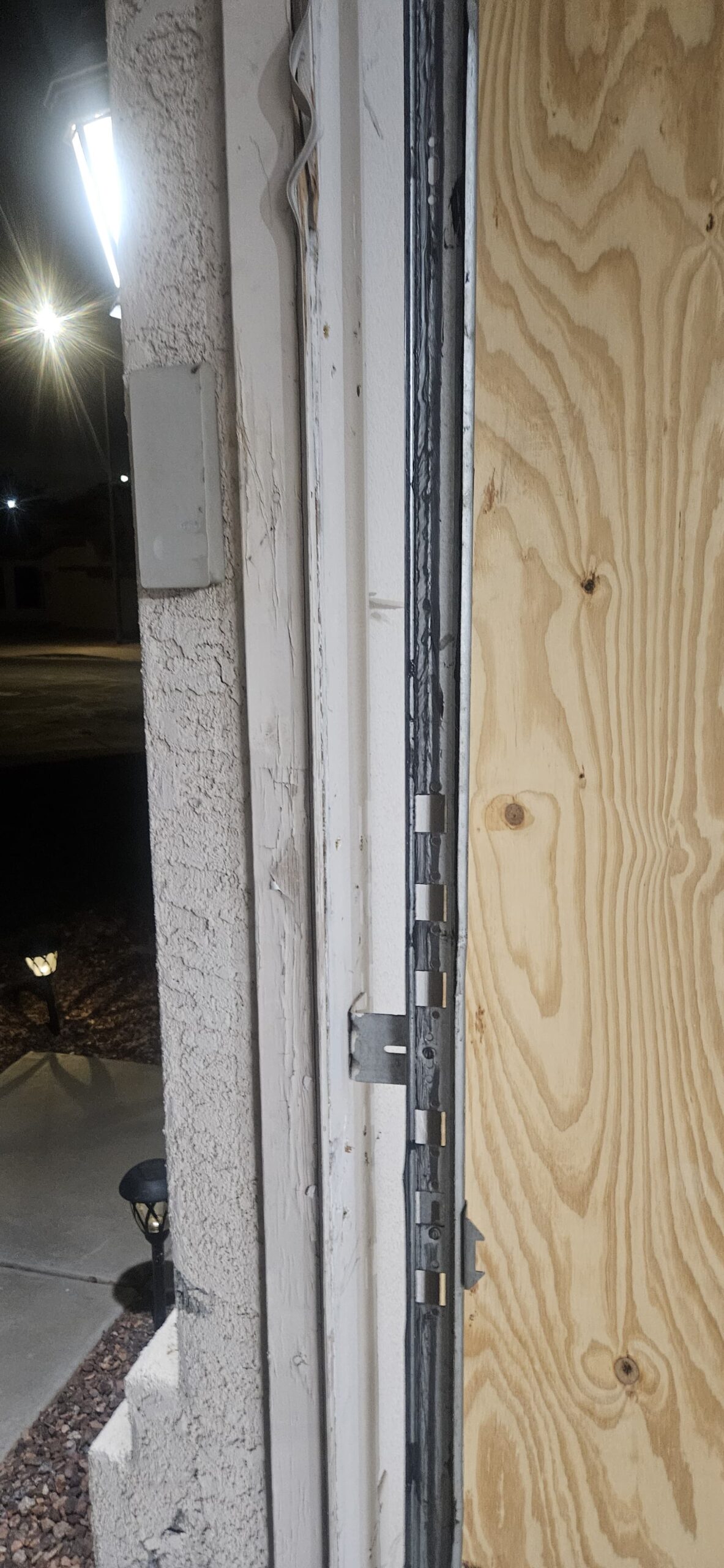 Fixed garage door frame beside track after repair on W Monte Vista Rd