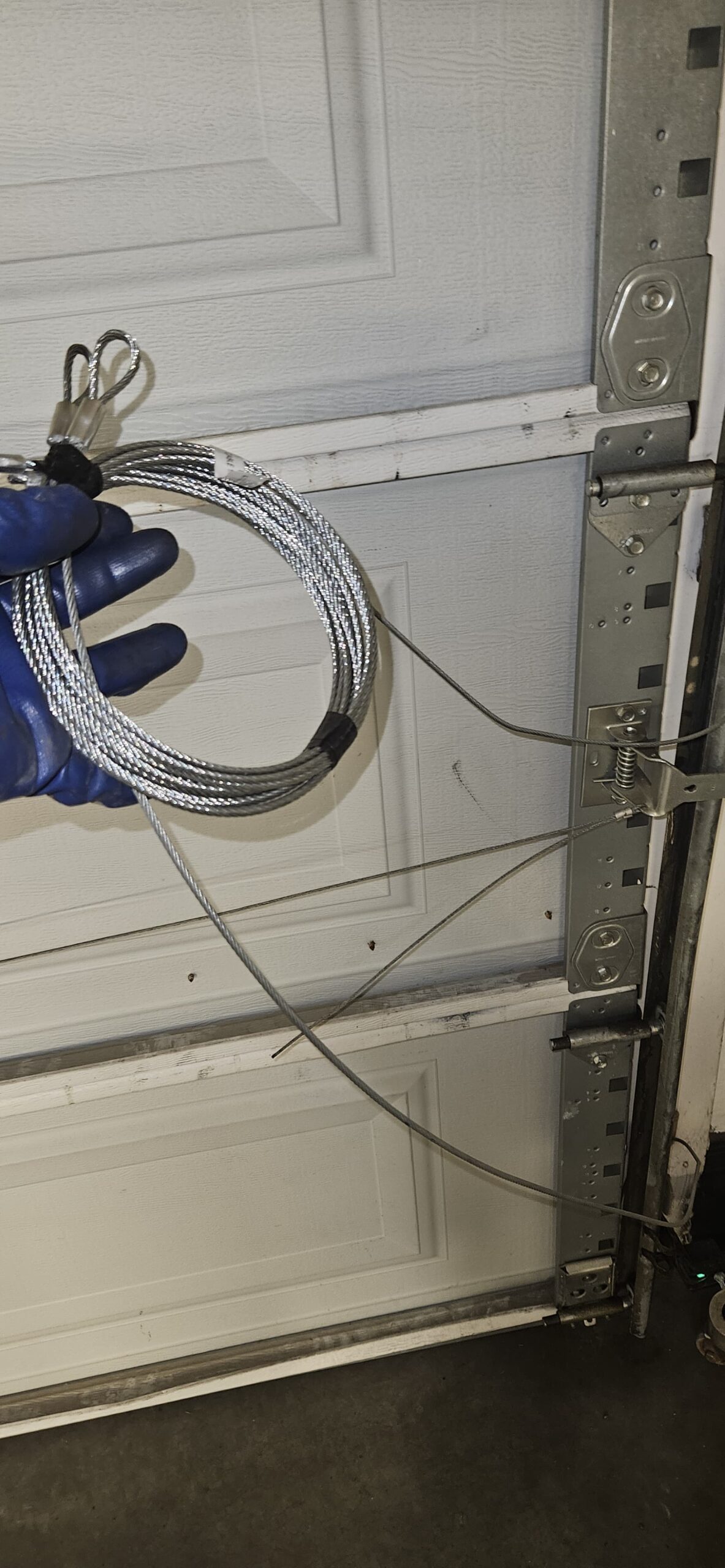 New garage door cable installed during an Avondale garage door repair
